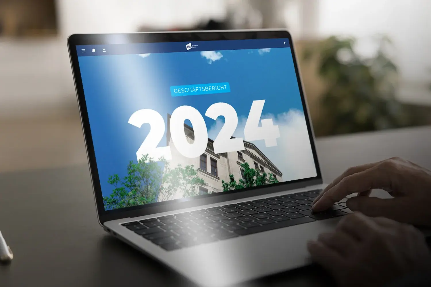 Mockup der Startseite des Geschäftsberichtes der LfA Bayern 2024
